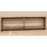 A provincial 19th century pine plate rack, possibly French, of gently tapering form, with serrated