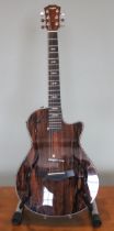 A 2016 Taylor T5Z Koa hollow body electric guitar, made in USA, serial number 1104256127, rose