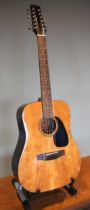A Samick acoustic 12 string SW 115-12 guitar, made in Korea, serial number 96120024, with Fishman