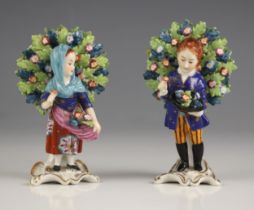 Two English porcelain bocage figures, one modelled as a girl selling flowers, 10cm high, the other