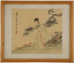 Chinese School (20th century), Gouache on silk, A lady holding a fan in a garden, Signed, Framed and