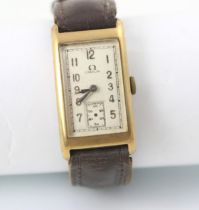 An early 20th century Omega wristwatch, the rectangular dial with Arabic numerals and subsidiary