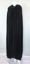 A Biba black velvet hooded cloak, maxi length, with satin lining, 'Biba' maker's label to