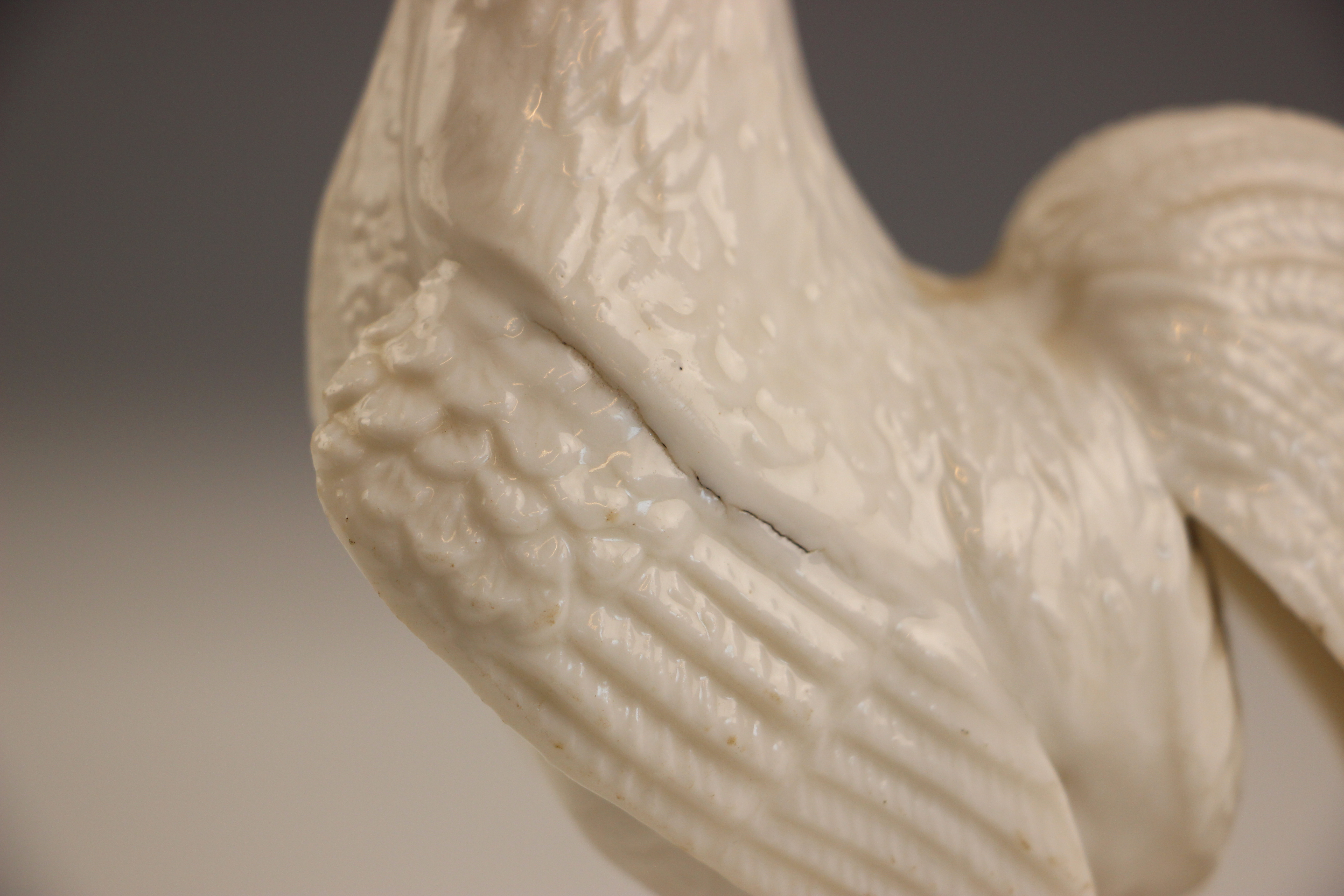 A Chinese porcelain Blanc De Chine model of a cockerel, circa 1700, 17cm high (at fault) - Image 5 of 8