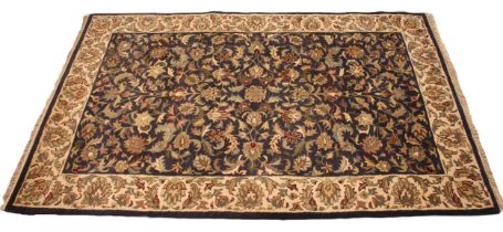 A handmade Indian wool pile tea washed Jaipur rug, the all over floral design in autumnal shades