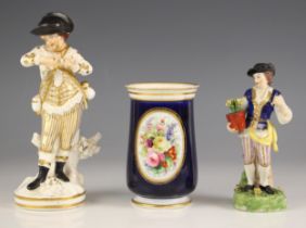 A Royal Crown Derby porcelain figure, 20th century, modelled as a gentleman with a flowerpot
