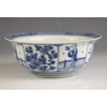 A Chinese porcelain blue and white bowl, 19th century, Kangxi four character mark, decorated in