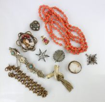 A large collection of jewellery, including a string of untested pink coral beads, a paste set