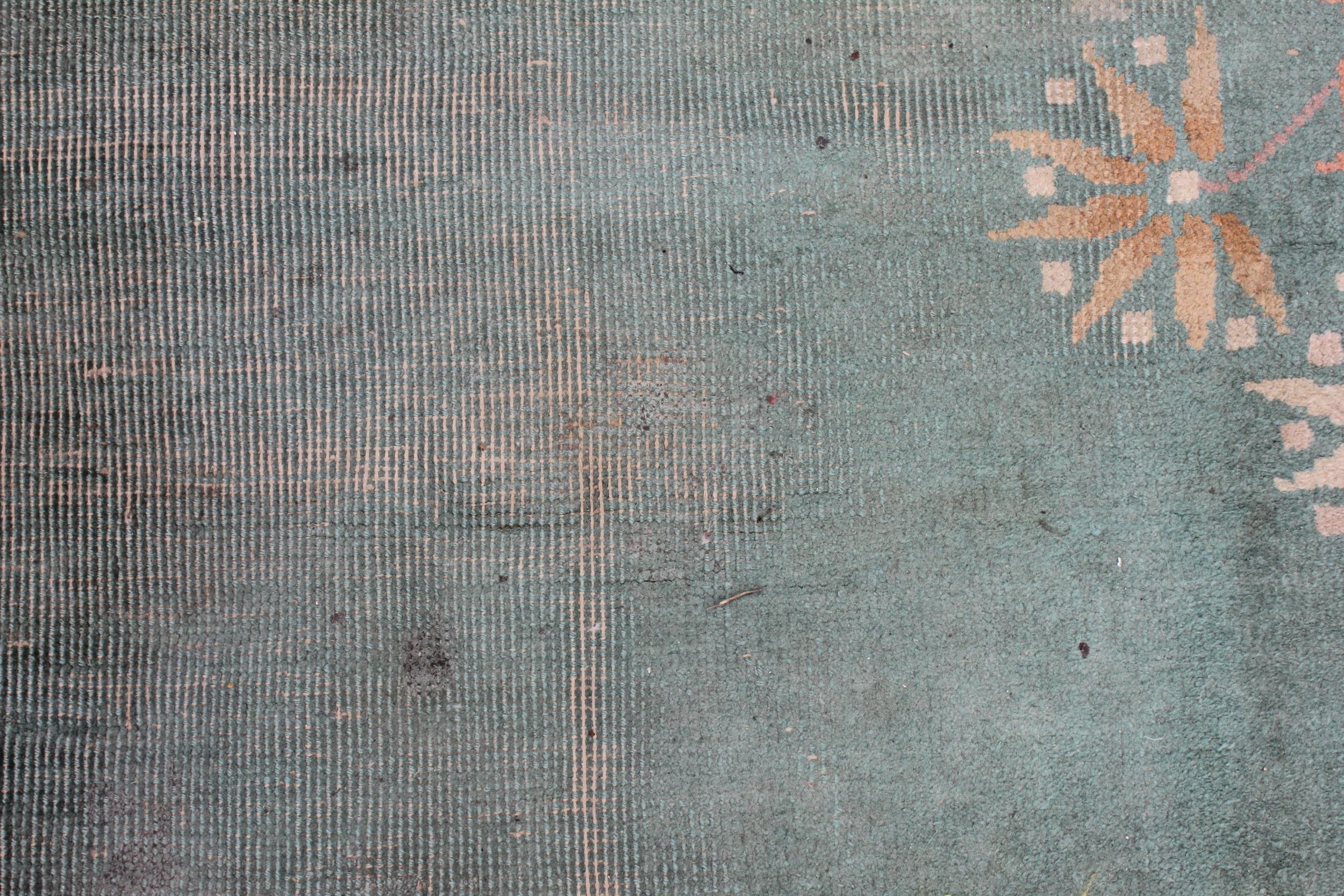 A large Chinese wool carpet, early 20th century, with floral motifs against a duck egg blue - Image 5 of 7