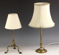 An Arts & Crafts brass desk lamp in the manner of W. A. S. Benson, raised on three short cabriole