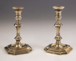 A pair of Victorian silver candlesticks, Hawkesworth, Eyre and Co, Sheffield 1898, of Charles II