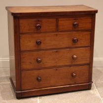 A Victorian mahogany chest of drawers, the rectangular top with rounded front corners over an