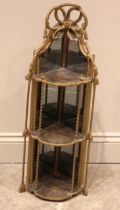 A Victorian giltwood and gesso mirrored corner wall shelf, the rope tied crest extending to rope