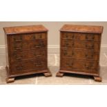 A pair of figured walnut chests, early 20th century and later constructed, each formed with four