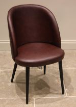 A Heals 'Austen' nut brown leather tub desk chair, the curved back rest over a bow front seat,