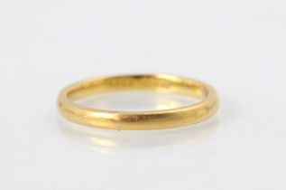 A 22ct yellow gold wedding band, stamped 'HG&S' Birmingham 1948, ring size L, 2.6gms