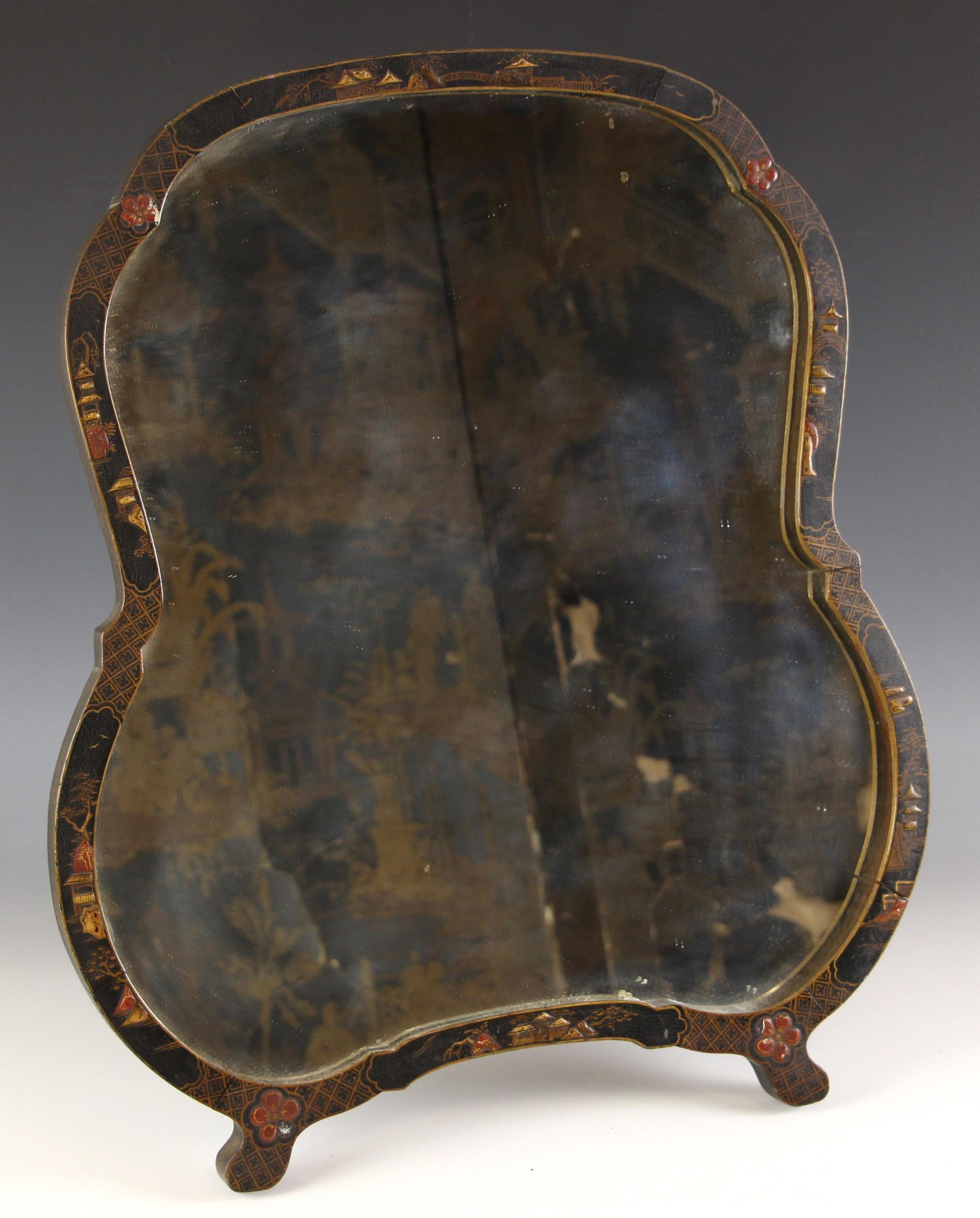 A Chinese chinoiserie black lacquer easel dressing table mirror, early 20th century, the