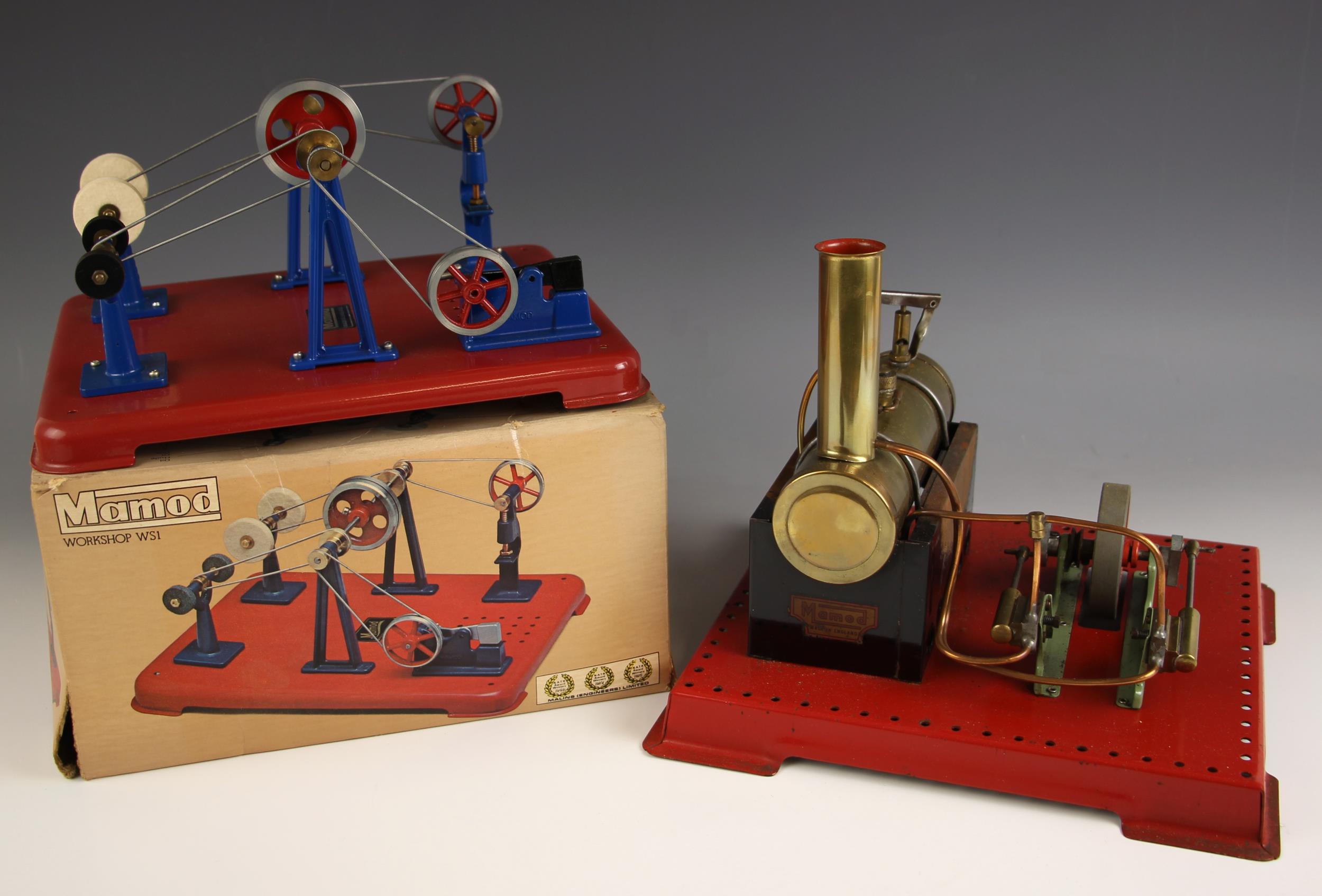 A Mamod live steam engine, the base 24cm wide, with a Mamod WS1 Workshop, the base 25cm wide, in