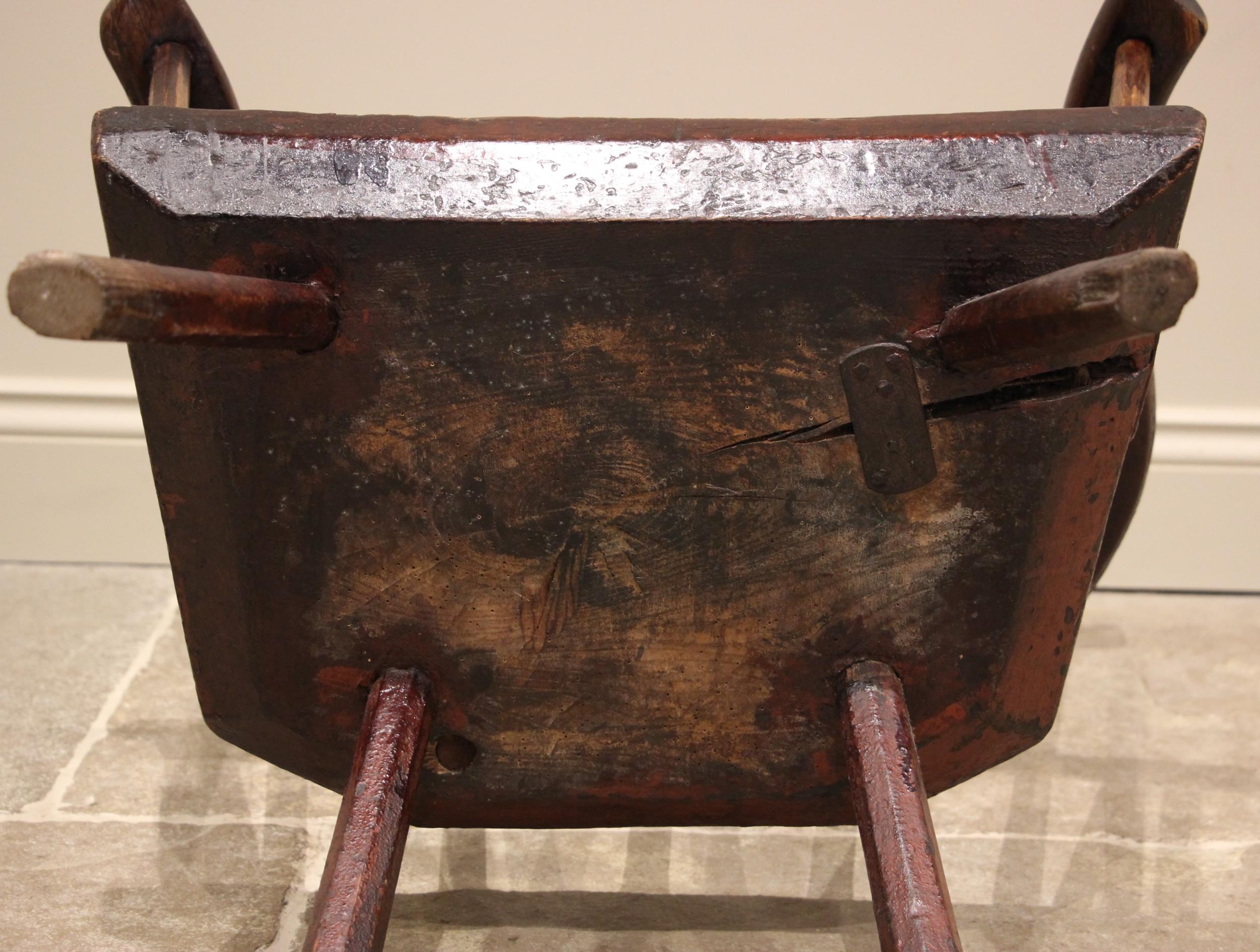 A primitive stained ash comb back chair, probably West Country, late 18th/early 19th century, the - Image 3 of 8