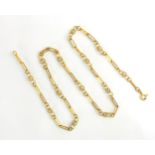 A 9ct yellow gold fancy link chain, the rope twist links with circular infinity style links, bolt