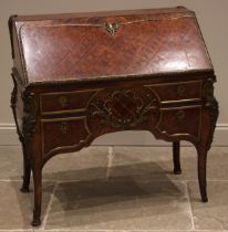 A French kingwood and walnut lattice parquetry bureau, circa 1860, applied with ormolu mounts and