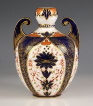 A Crown Derby vase, late 19th century, of twin handled bulbous form, decorated in the Imari pattern,