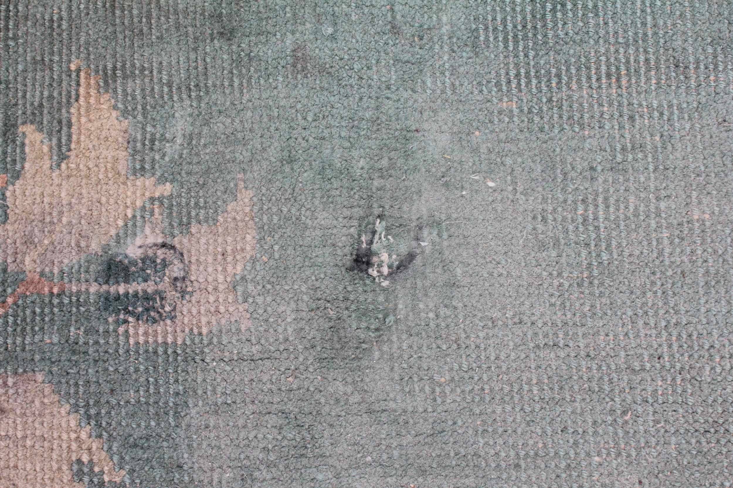 A large Chinese wool carpet, early 20th century, with floral motifs against a duck egg blue - Image 3 of 7