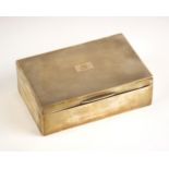 A George V silver cigarette box, ‘DBros’ Birmingham 1947, of rectangular form with engine turned
