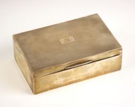 A George V silver cigarette box, ‘DBros’ Birmingham 1947, of rectangular form with engine turned
