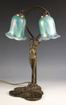An Art Nouveau style cast brass table lamp, 20th century, modelled as a stylised female figure