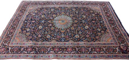 A rich blue ground Persian Kashan carpet, the Shabazz lozenge medallion on a royal blue ground
