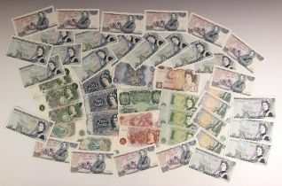A selection of Bank of England notes, including a group of consecutive £5 notes, £1 notes, ten