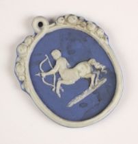 An Enoch Wood Jasper Ware plaque, late 18th century, of oval form with a central relief of a Satyr