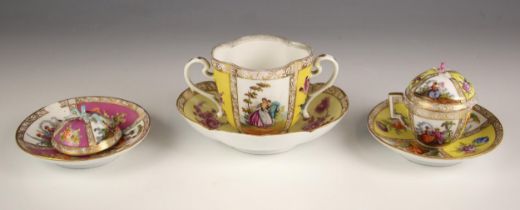 An Augustus Rex twin handled chocolate cup, late 19th century, of quatrefoil shape, painted in the