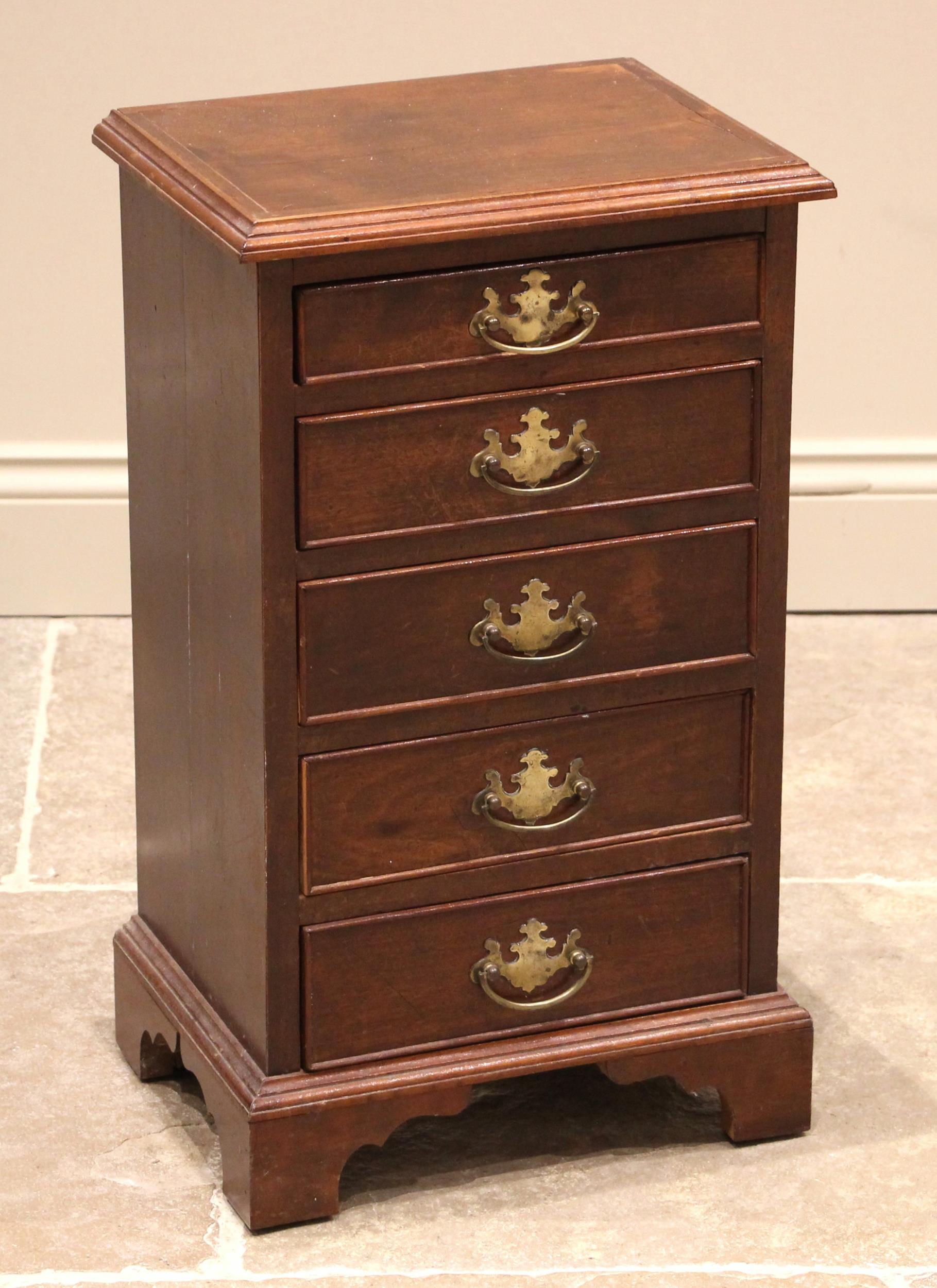 A 19th century and later constructed mahogany collectors pedestal chest, formed with five
