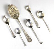 An Edwardian silver picture back dessert spoon, George Unite, Birmingham 1907, with foliate engraved
