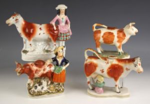 A Staffordshire pearlware cow creamer and cover, late 18th century, modelled standing with a