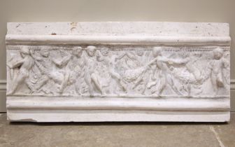 After the antique, a 19th century plaster frieze, relief moulded with a scene of putti, 41cm x