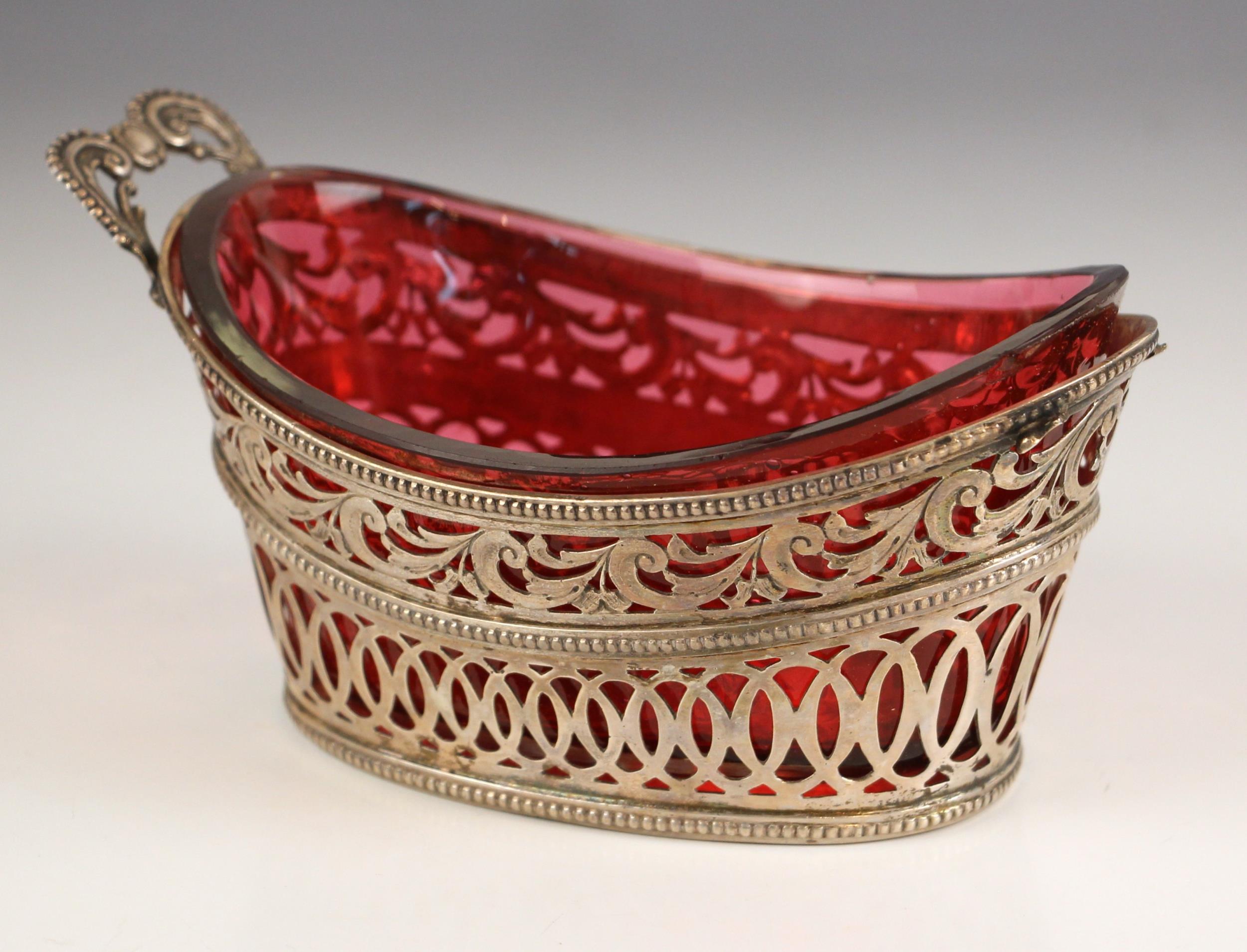 A continental Victorian silver sweetmeat basket, import marks for Samuel Boyce, Sheffield 1899,