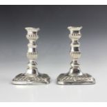 A pair of Edwardian silver candlesticks, Horace Woodward & Co Ltd, London 1903, the urn shaped
