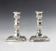 A pair of Edwardian silver candlesticks, Horace Woodward & Co Ltd, London 1903, the urn shaped