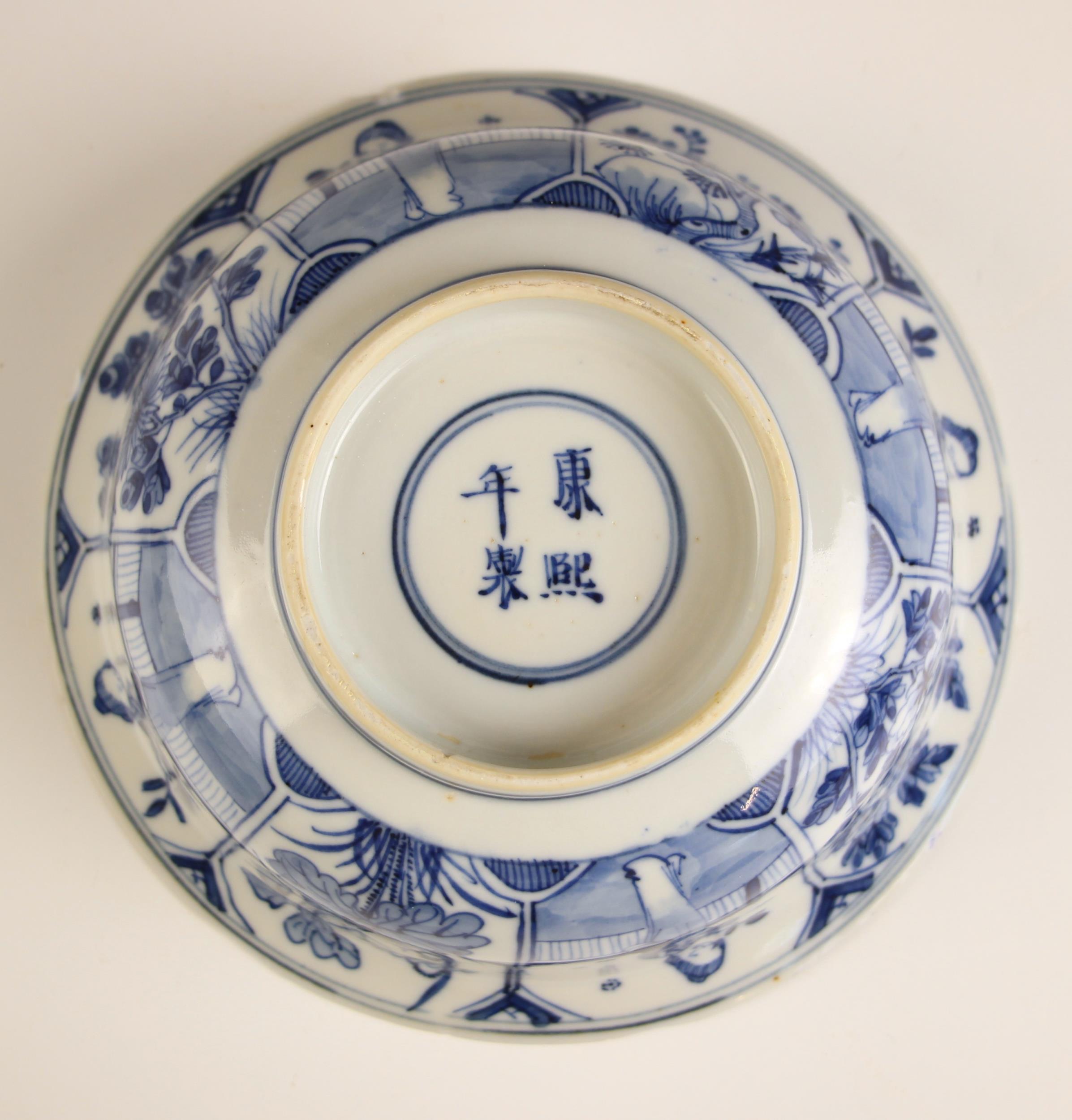 A Chinese porcelain blue and white bowl, 19th century, Kangxi four character mark, decorated in - Image 3 of 7