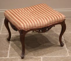 A French walnut dressing stool, late 19th century, the rectangular upholstered seat over a