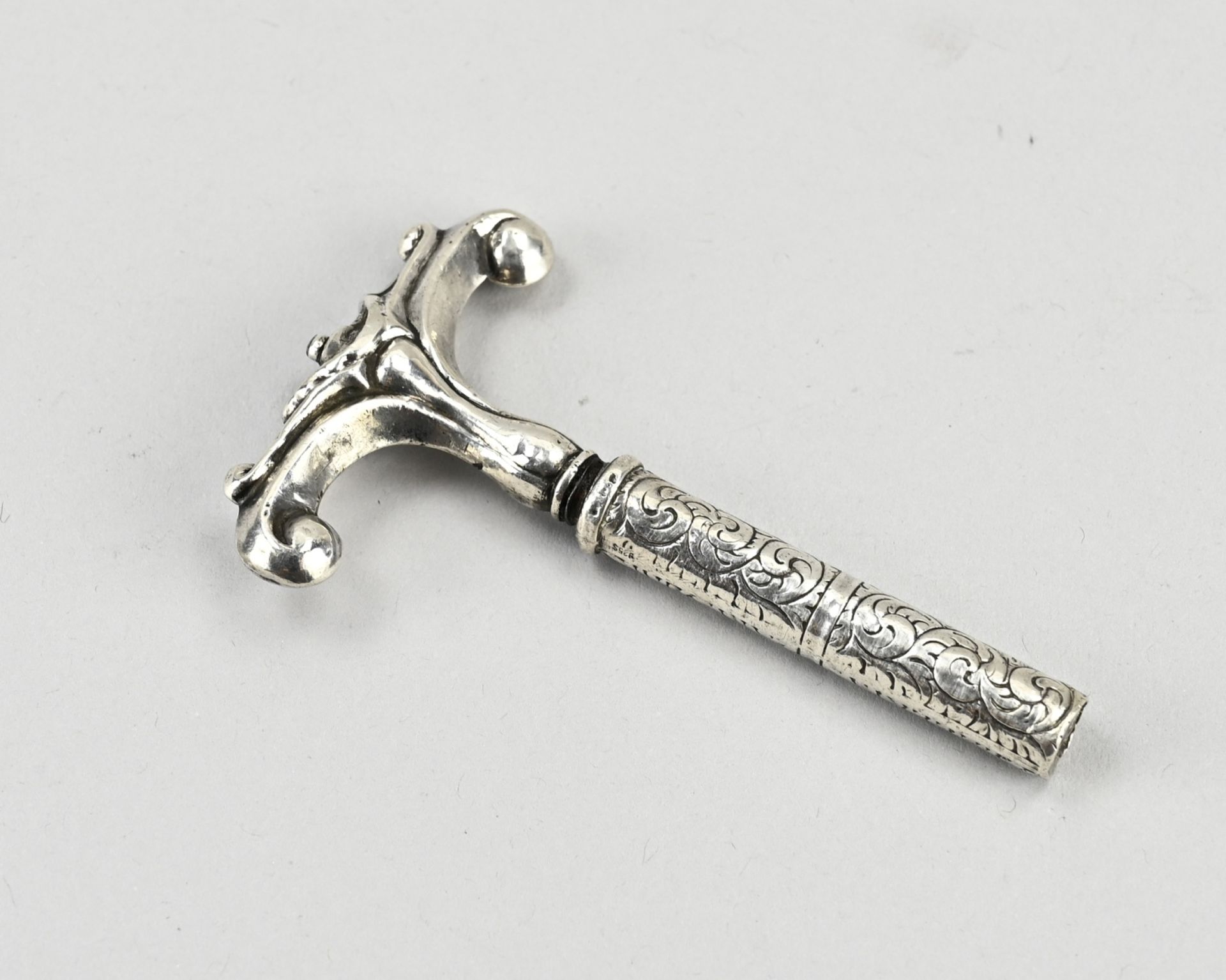 Silver corkscrew with sleeve