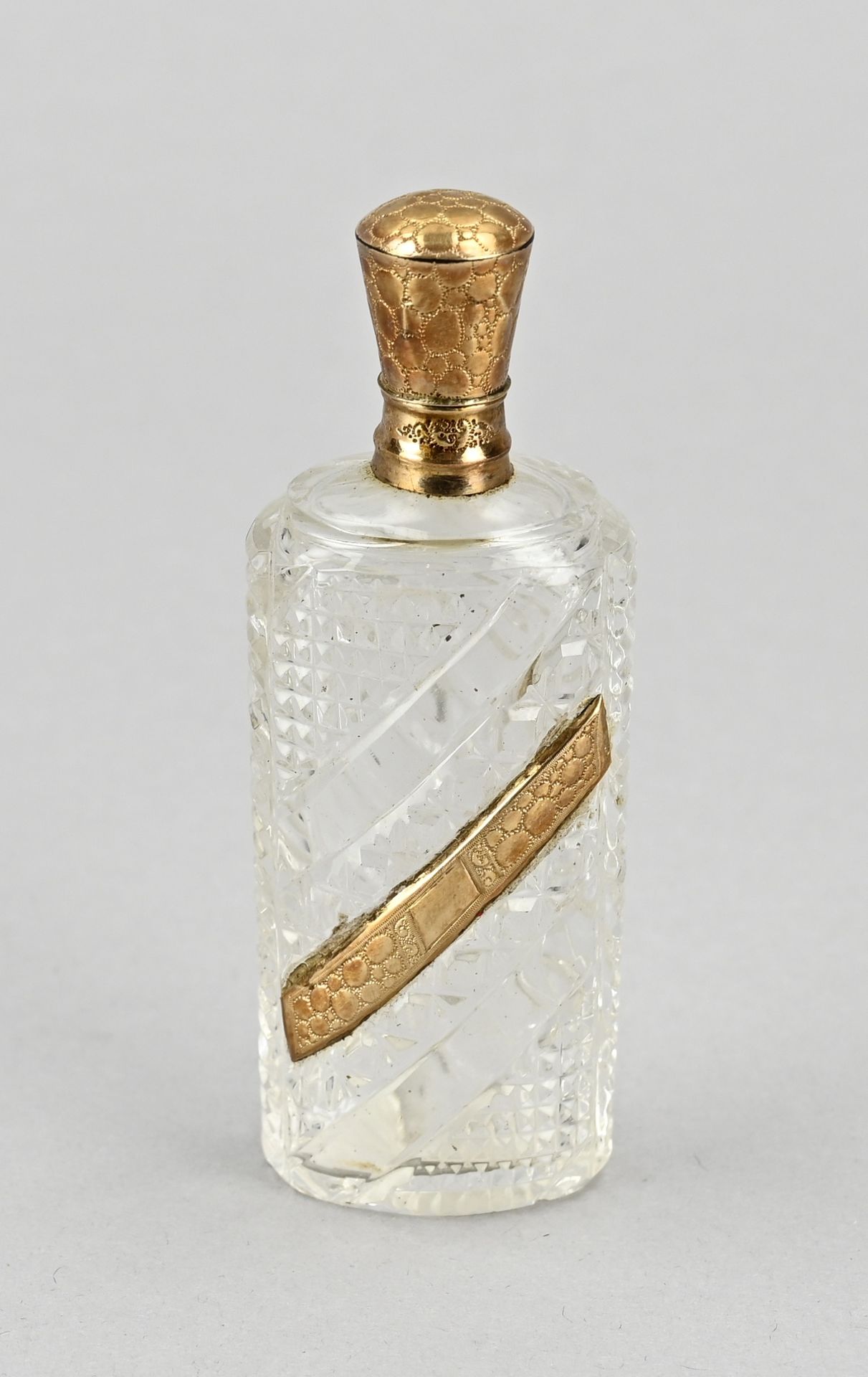 Odeur bottle with gold