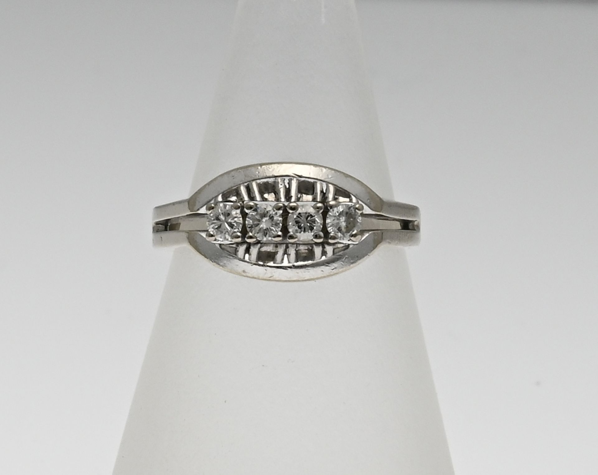 White gold ring with diamond