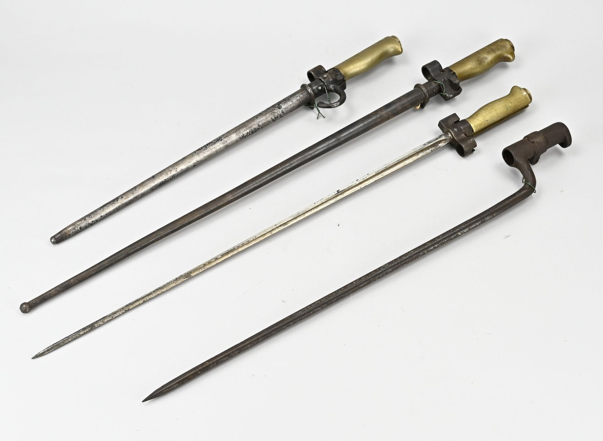Four antique long bayonets