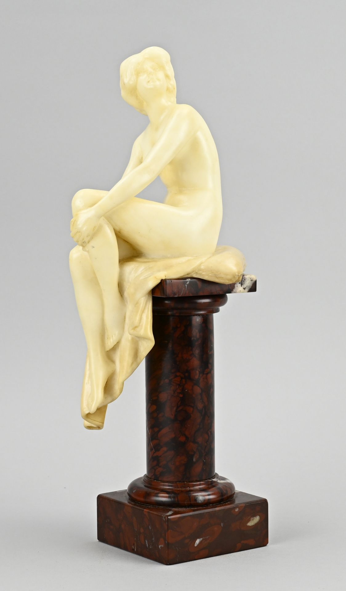 Sculpture on column, 1900