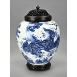 Chinese lidded jar on console