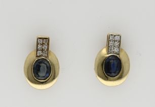 Gold stud earrings with sapphire and diamond